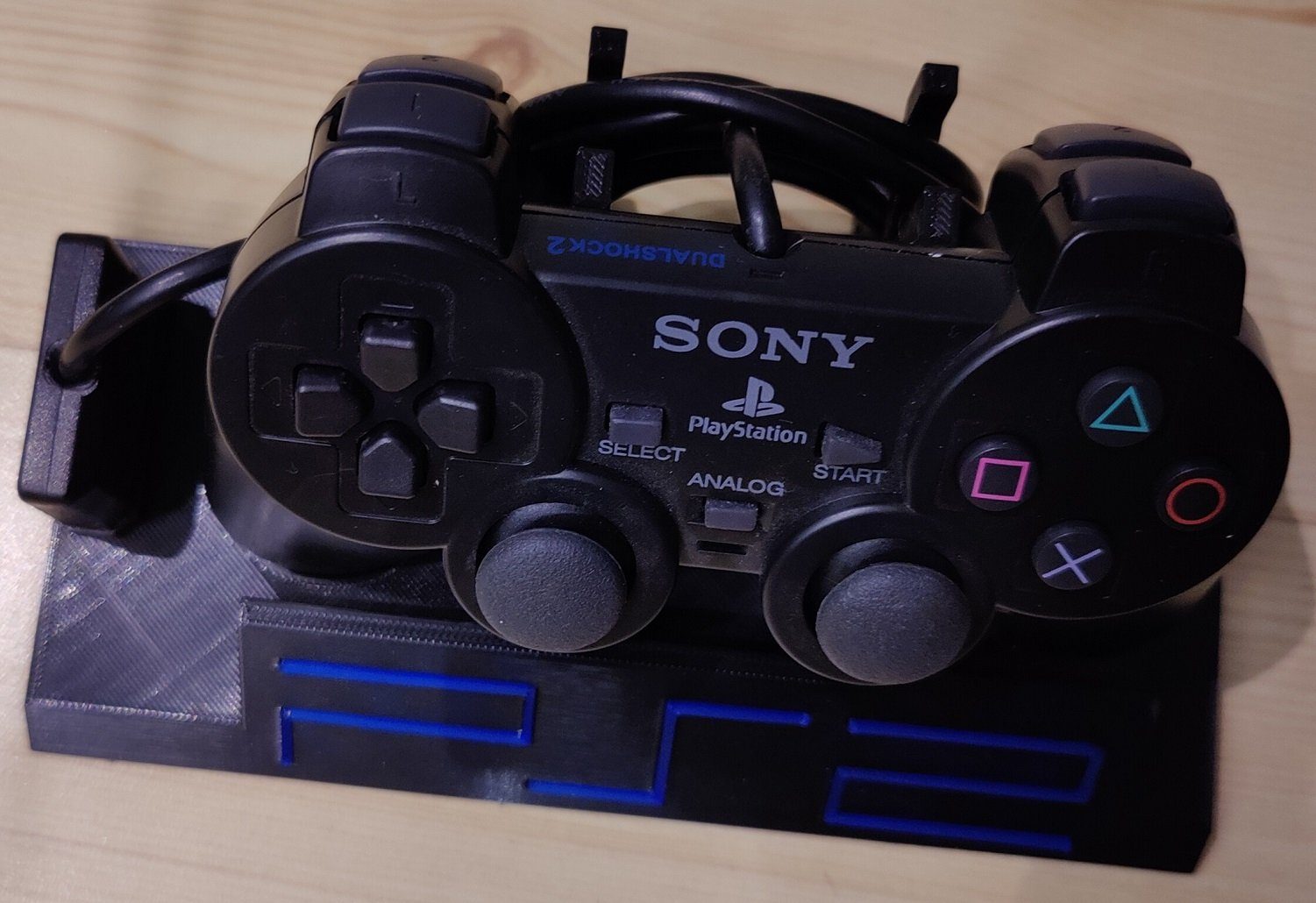 #65 PS2 Controller Stand With Playstation 2 Logo — vue 3