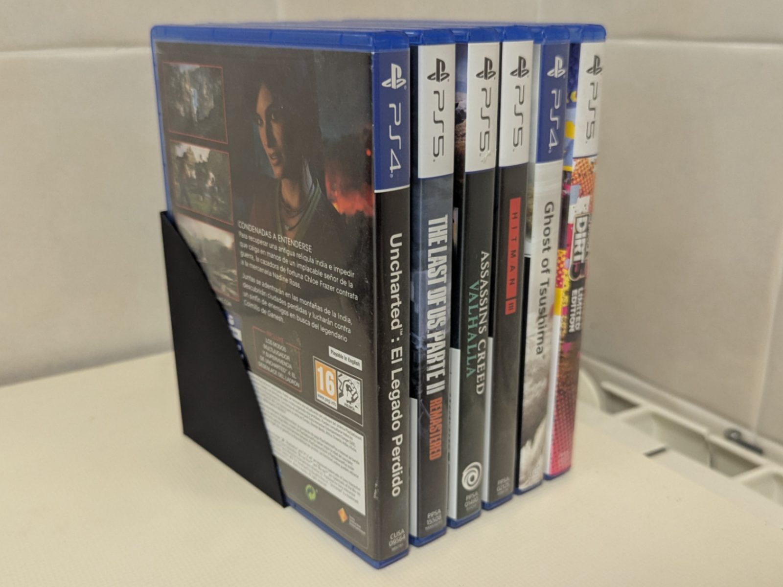 Invisible Bluray/PS5/PS4 games holder — vue 1
