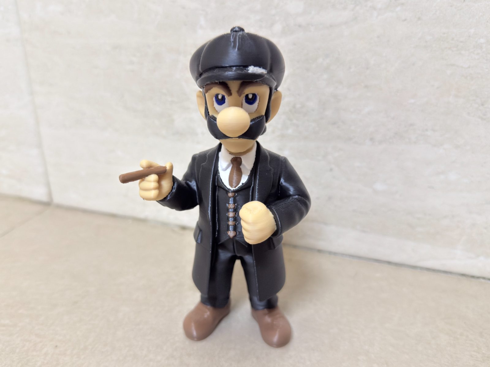Luigi Bros Peaky Blinders hand — vue 1